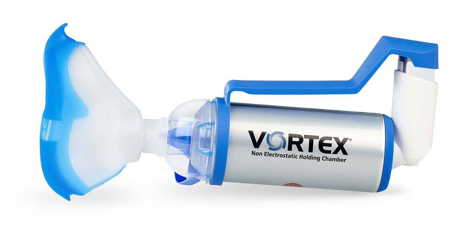 Vortex ei-sähköstaattinen pidätyskammio, jossa sininen kasvonaamio ja inhalaattorin kiinnike.