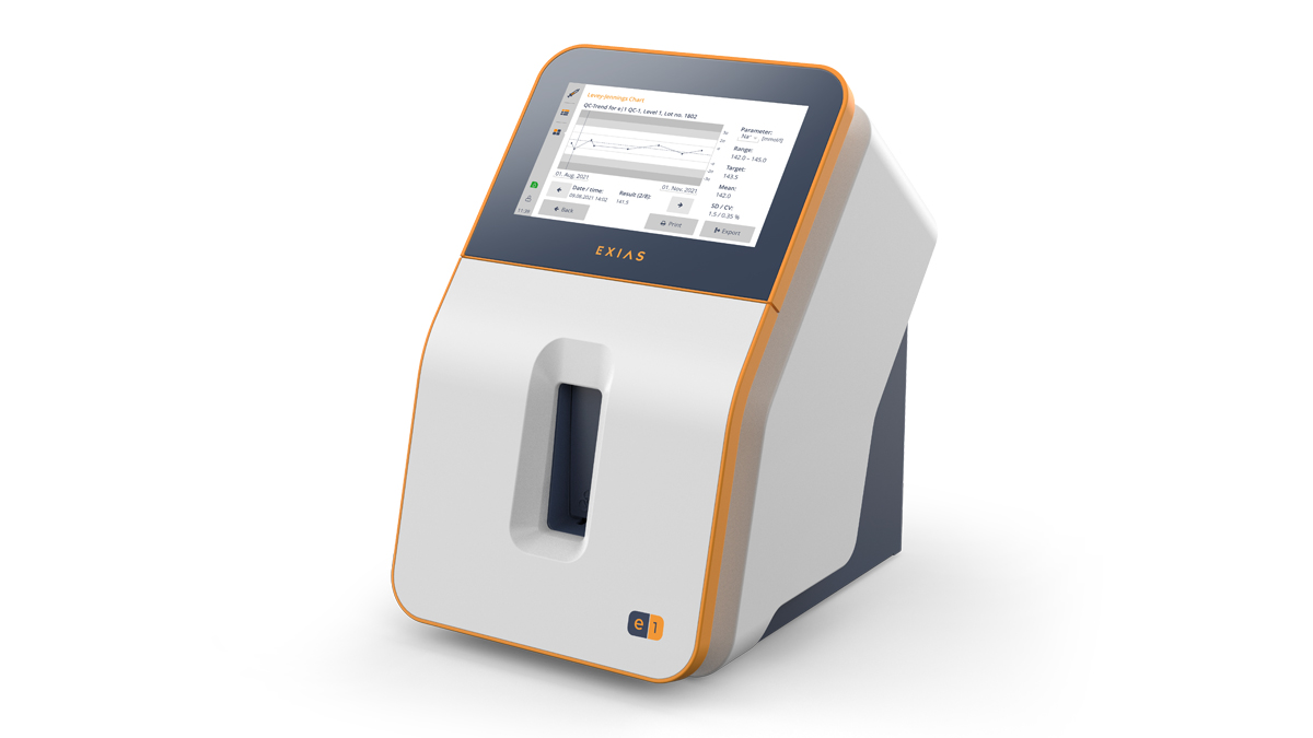 Nykyaikainen lääkinnällinen laite kosketusnäytöllä, joka näyttää kaavioita ja tietoja, etupuolella merkintä "EXIAS".